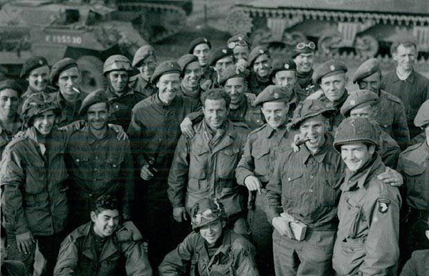 E Co. 2nd BN. 506th PIR posing with Brits. Photo most likely taken in Holland..jpg