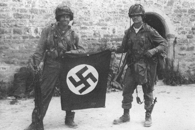 23 Dec 1920 birthday of Easy Company veteran John Lee Eubanks. John can be seen holding the flag with Walter Gordon..jpg