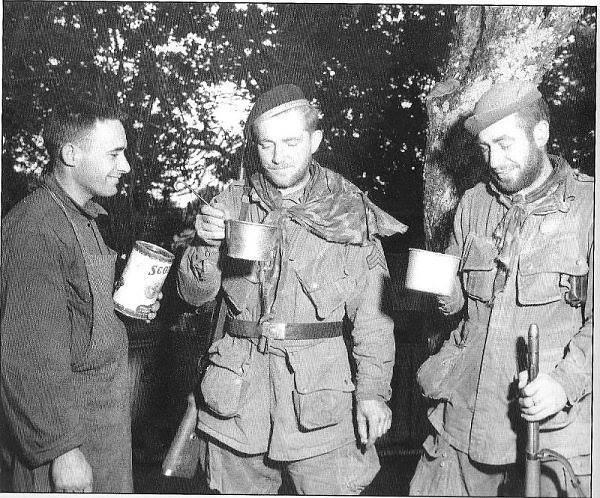 American troops of the 82nd Airborne Division post with captured German treasures. I believe that's a G-41.jpg